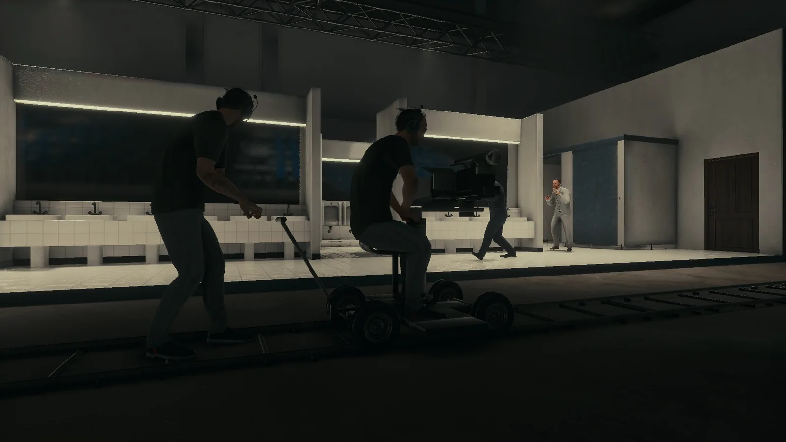 Camera crew on a dolly filming the BLACKWOOD bathroom set inside the sound stage