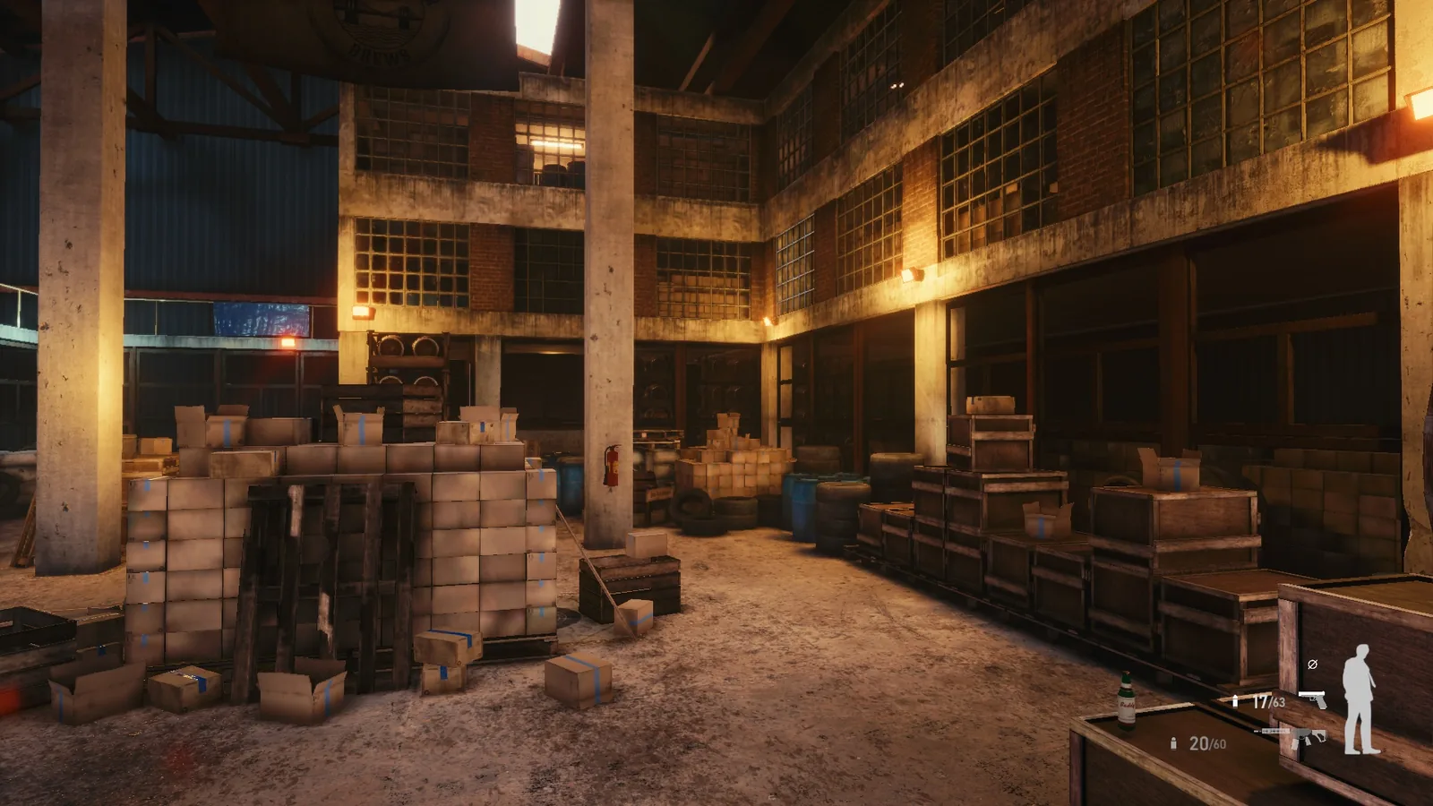Tall storage hall in BLACKWOOD lit by high windows, with stacked cardboard boxes, pallets and steel columns