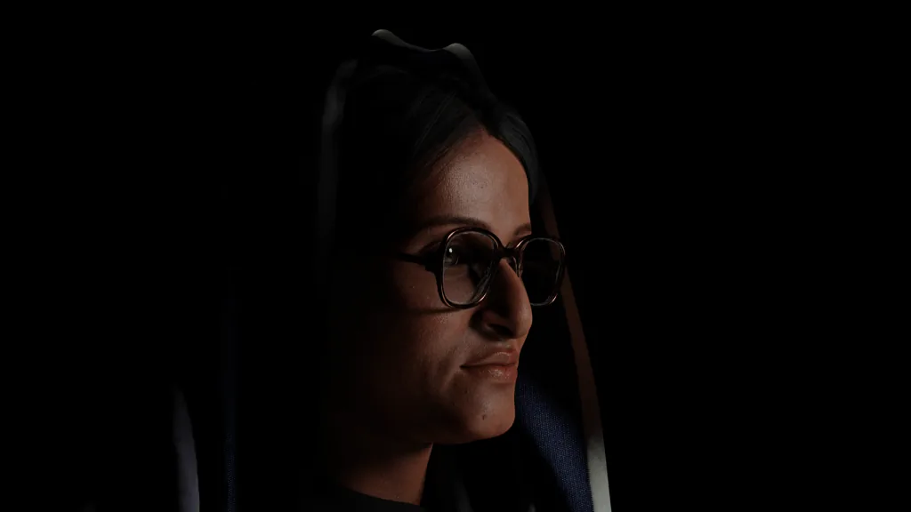 Dark 3D portrait of a woman in glasses lit from one side